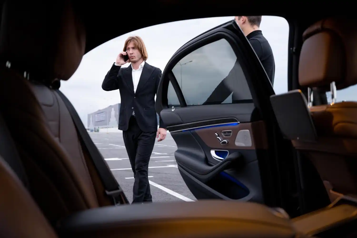 Business executive using chauffeur services in Newcastle Under Lyme